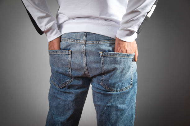 istock Male hands in pocket of jeans. 1425171966