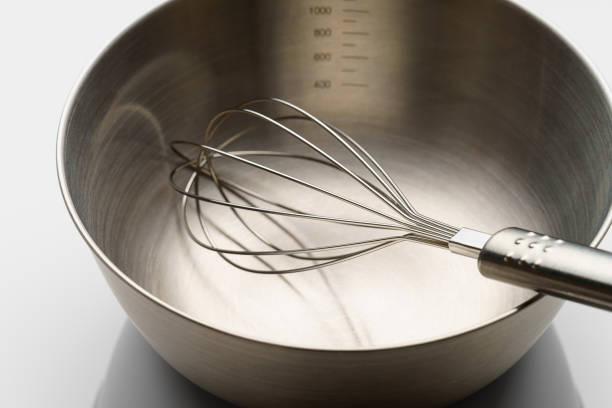 istock stainless whisk and bowl on white background 1425172930