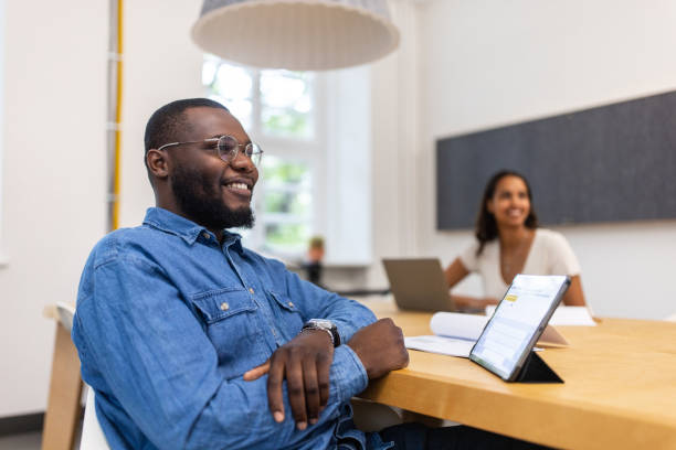 istock African man during video conference in startup office boardroom 1425175424