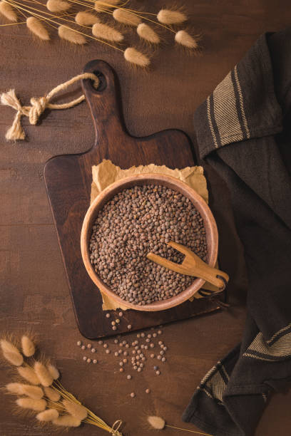 istock Brown lentils in a ceramic bowl 1425177186