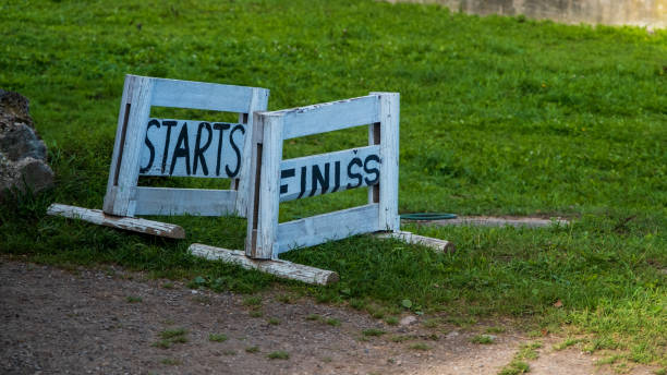istock Small white wooden sign start and finish. 1425179751