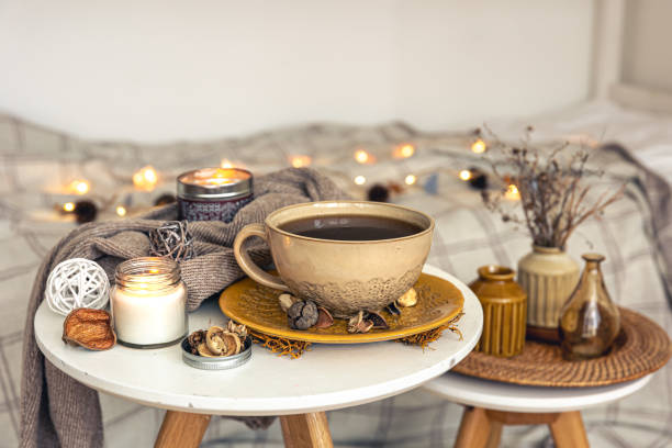 istock Cozy autumn composition with a cup of tea and decorative details. 1425181827
