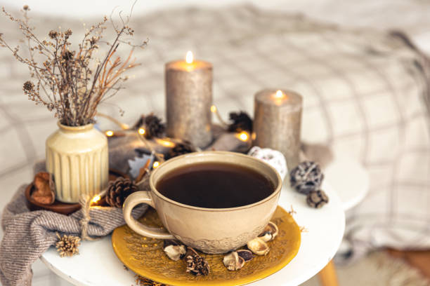 istock Cozy autumn composition with a cup of tea and decorative details. 1425181859