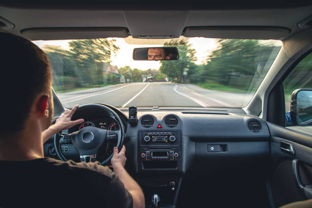 istock Hands on the wheel when driving at high speed from inside the car. 1425184177