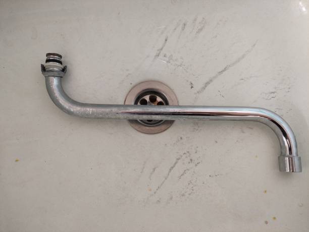 istock Broken water faucet, a kitchen faucet repair 1425186541
