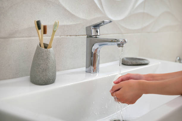 istock A child washes his hands in the bathroom. 1425189645