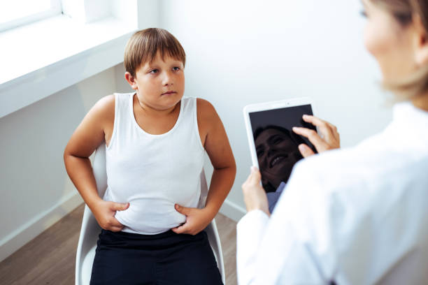 istock Upset boy during nutritionists appointment. 1425191277