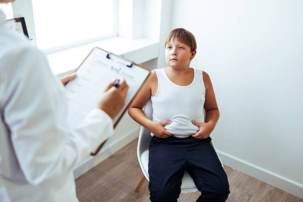 istock Little boy visiting professional nutritionist in office 1425191352
