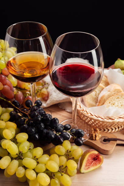 istock wine and grapes on the table 1425191425
