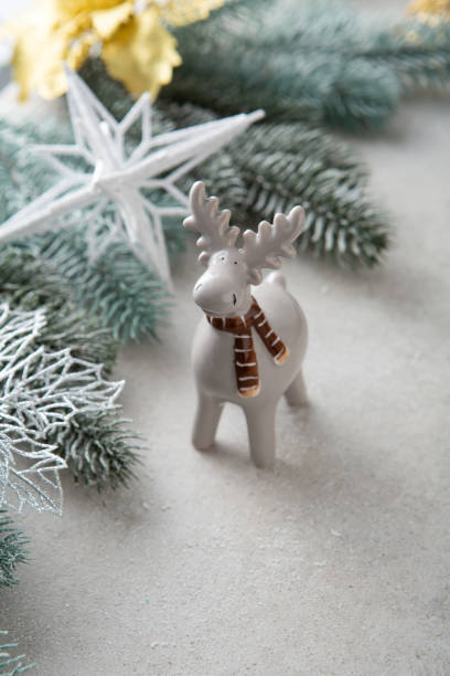 istock Chritmas decoration deer and green xmas branches holiday concept 1425192630