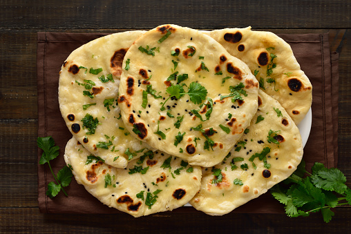 Homemade indian naan bread. Top view, flat lay. Top view, flat lay
