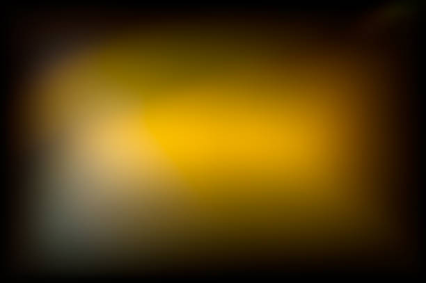 Abstract blurred background, a spot in a yellow tone in a dark frame. Background for design. Web banner.