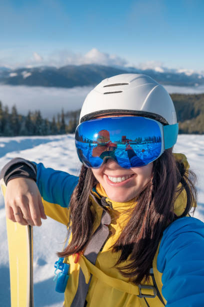 istock smiling skier woman portrait 1425207004