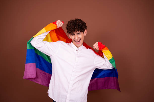 istock Young attractive guy with a rainbow flag. 1425210297