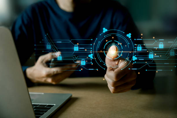 istock businessmen Fingerprint scanning and biometric authentication, processing of biometric for access personal data , cybersecurity concept . 1425211050