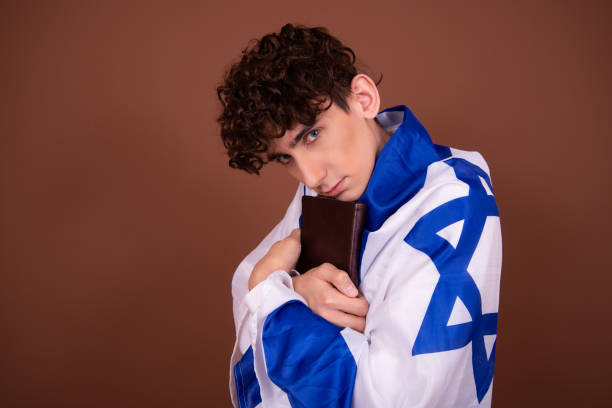 A young handsome guy with an Israeli flag. Handsome man israeli ethnicity stock pictures, royalty-free photos & images