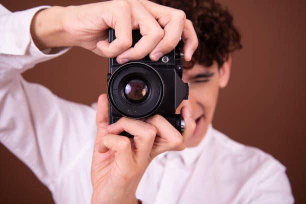 istock Funny attractive guy and selfie. 1425211953