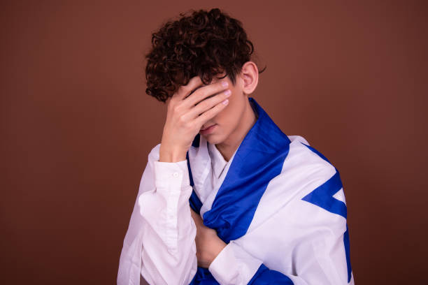 istock A young handsome guy with an Israeli flag. 1425212324