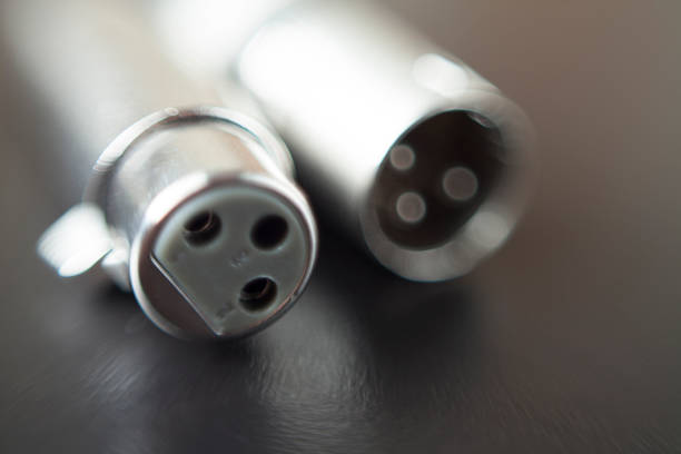 istock xlr audio cable on top of a black table. 1425216549