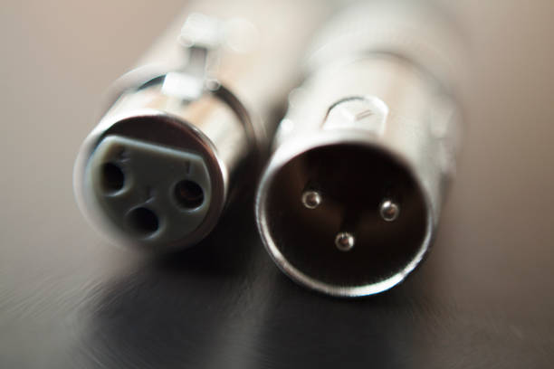 istock xlr audio cable on top of a black table. 1425216584
