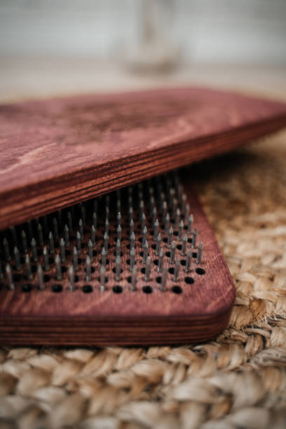 Sadhu board close-up. Standing on nails. Meditation and relaxation. Concept on healthy lifestyle. stock photo