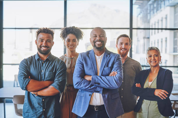 istock Global business, motivation and success vision for teamwork, collaboration and diversity men and women in office. Portrait of smile, happy and leadership manager with working company employee people 1425223575