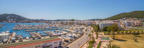 Panoramic view of marina of Santa Eulalia Marina and promenade of Santa Eulalia del Rio, Ibiza island, Balearic islands, Spain (Panorama) santa eulalia stock pictures, royalty-free photos & images