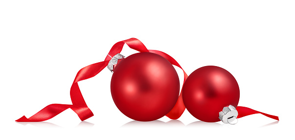 Christmas ball isolated on white background. Two red christmas ornament with ribbon.