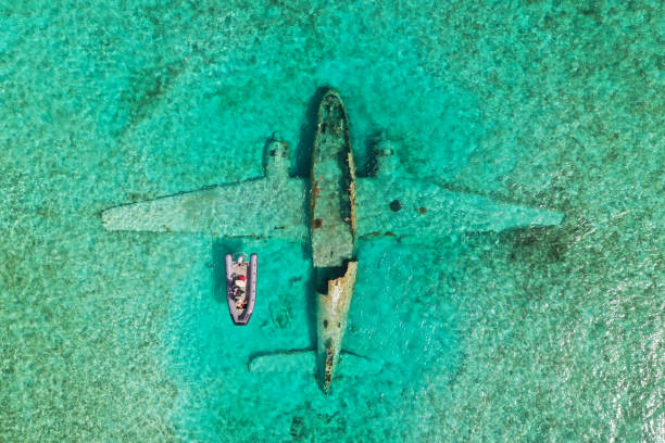 istock Plane crash with small boat over top 1425227572