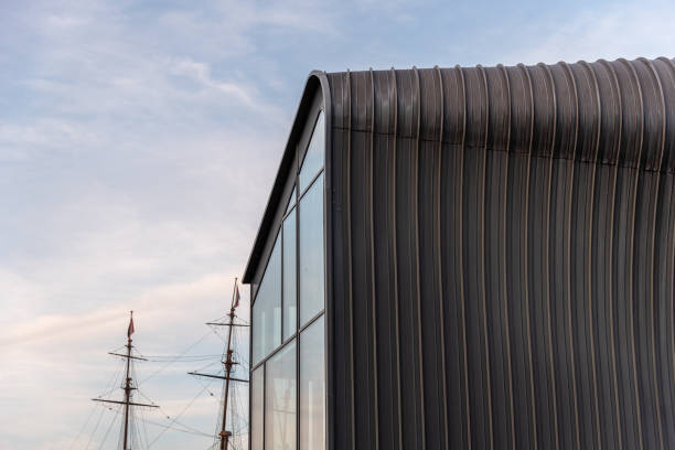 View of the Museum of Liverpool opened in 2011, reflects the city's global significance through its unique geography, history and culture.  People can be seen on the promenade