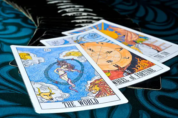 From Left to Right (The World, Wheel of Fortune, The sun). These 3 of tarot card in Major Arcana that show you will have a good luck in soon. Give someone who draw these cards a positive things. For example, Success in work or Win a lotto, etc. These cards are my artwork and design. Please see other photographs about Tarot Card in my Portfolio. /file_thumbview_approve.php?size=1&id=61566502