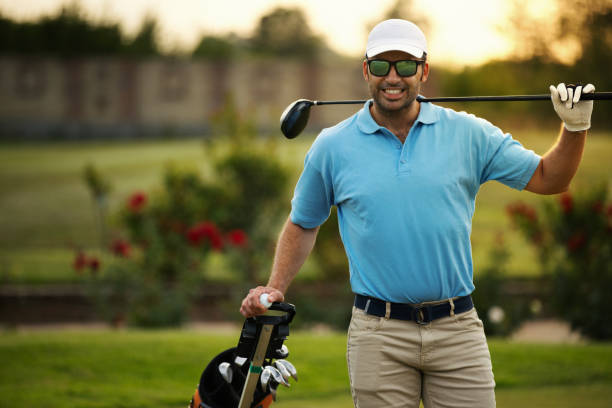 young man at a golf course. - golf expertise professional sport men imagens e fotografias de stock