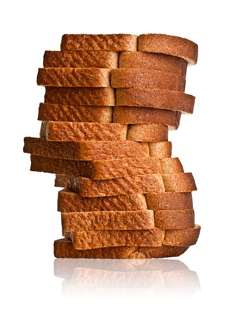 pain tranché isolé - pain tranché photos et images de collection