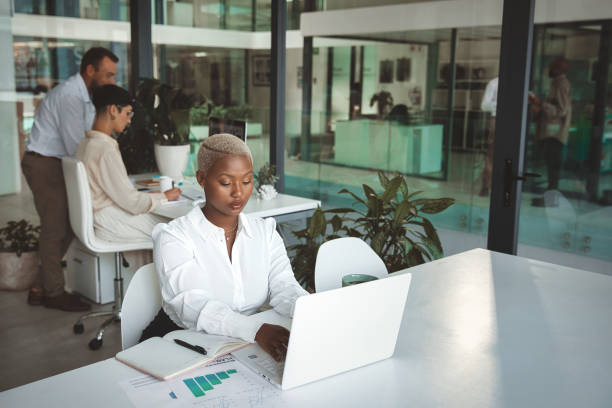 istock Beautiful business woman working 1425242940