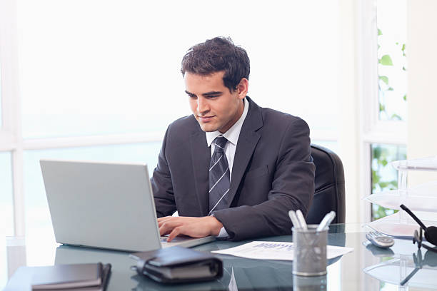 istock Businessman working with a laptop 142524487