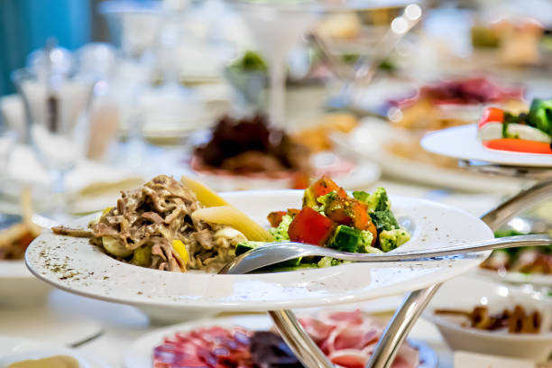 istock Caesar salad on the festive table in the restaurant 1425246745