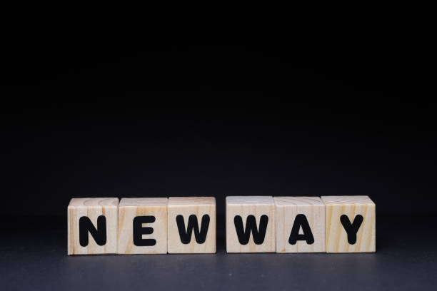 istock New way word on wooden cubes on black background 1425248131