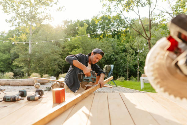 istock Carpenter cutting a wooden board 1425248872