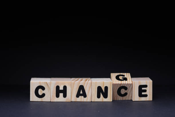 istock Change & Chance word on wooden cubes on black background 1425249097