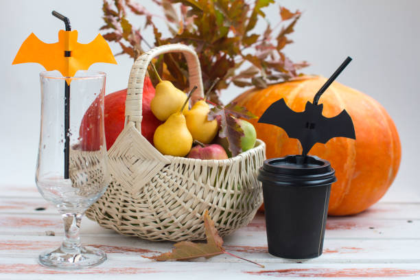 istock Pumpkin and paper cups with bats. Halloween Decoration 1425251104