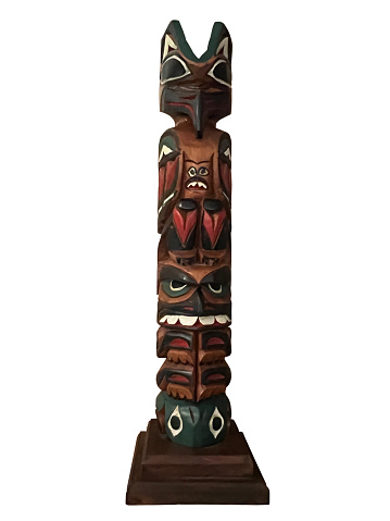 Totem Poles in Stanley Park, Vancouver, Canada - monuments created out of red cedar trees by First Nations of the Pacific Northwest