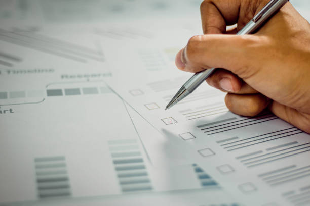 istock Financial statistics, infographics papers, check sums,forex profits. 1425261910