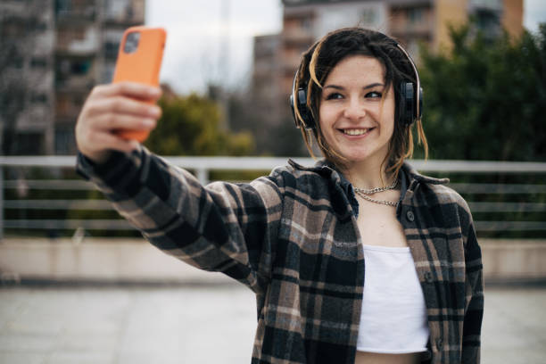 istock Young girl is dancing on the rooftop 1425264049