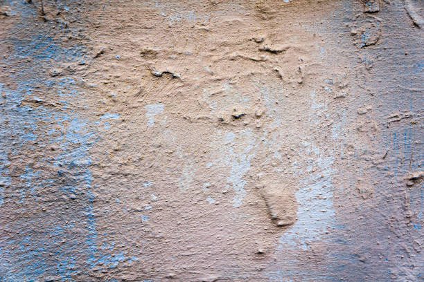 istock Texture of old beige concrete wall for background 1425266474