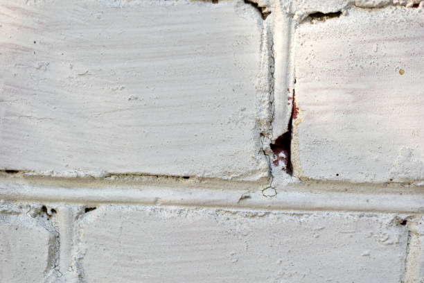 istock Whitewashed brick wall of the house during the day. 1425267343