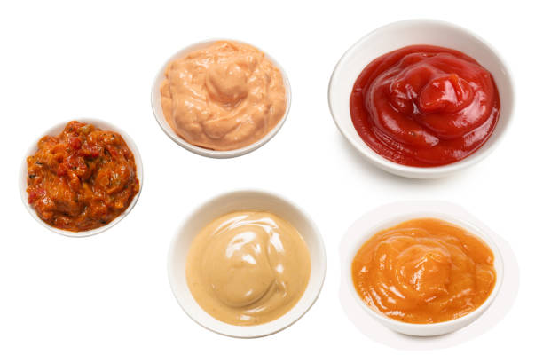 istock Ketchup in white plate on white background. 1425269900