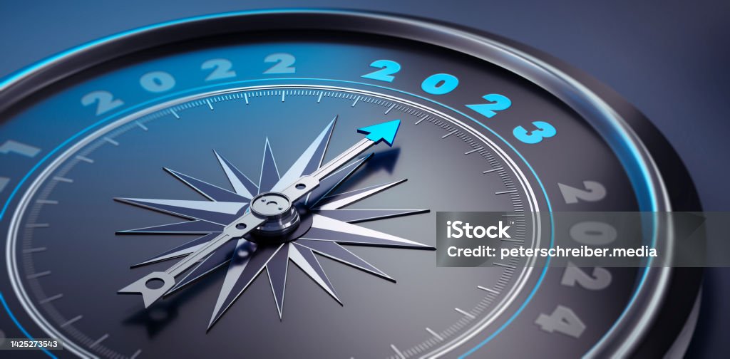 Dark stylish compass 2023 Dark compass with needle pointing to the year number 2023 Navigational Compass Stock Photo