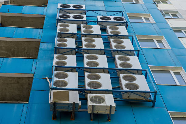 istock Wall with many air conditioners 1425277208