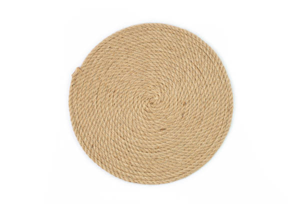 spiral-jute-seil-tischset, seitenansicht isoliert auf weiß - woven bamboo wicker textured stock-fotos und bilder
