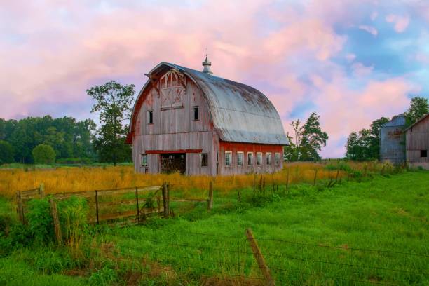istock Old weathered Red Barn at sunrise-Howard County, Indiana 1425292661